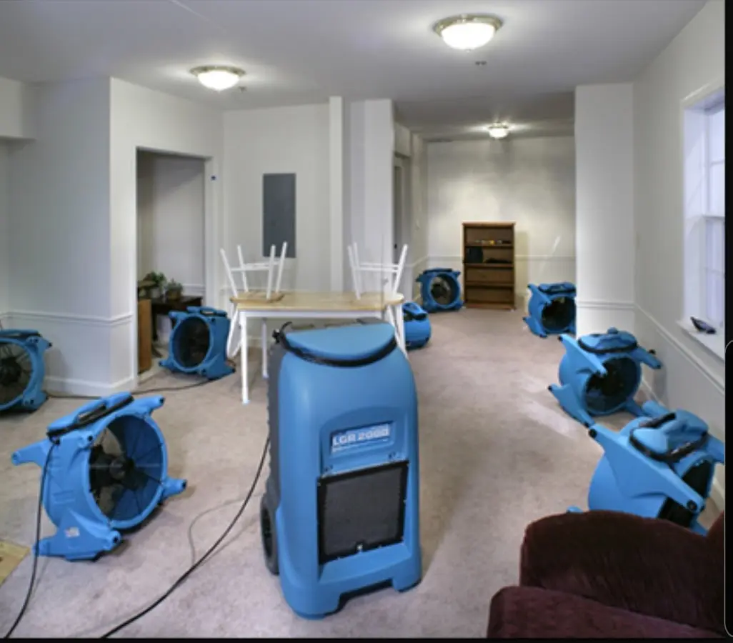 Air movers and dehumidifier setup for Water Damage Restoration in North Providence